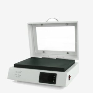 Close-up of the clear hinged humidity cover on the XH-2005 slide warmer for specimen protection.